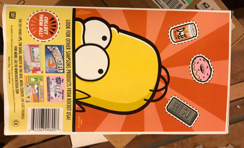 Simpsons: Homer Tin Action Toy - Rocket USA (The Simpsons) action figure collectible [Barcode 642063008007] - Main Image 2
