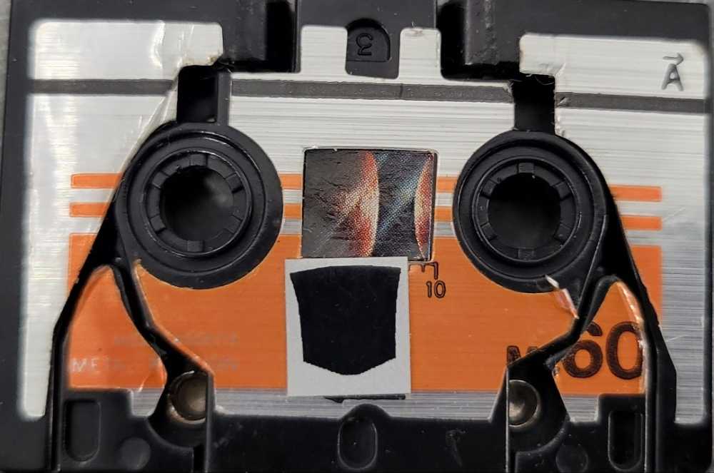 Buzzsaw Boxed Cassette - Hasbro (1984) action figure collectible - Main Image 2