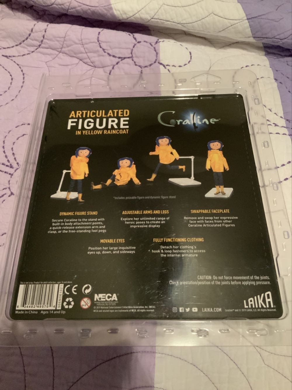 Coraline (In Raincoat) - Neca (Coraline) action figure collectible [Barcode 634482495704] - Main Image 2