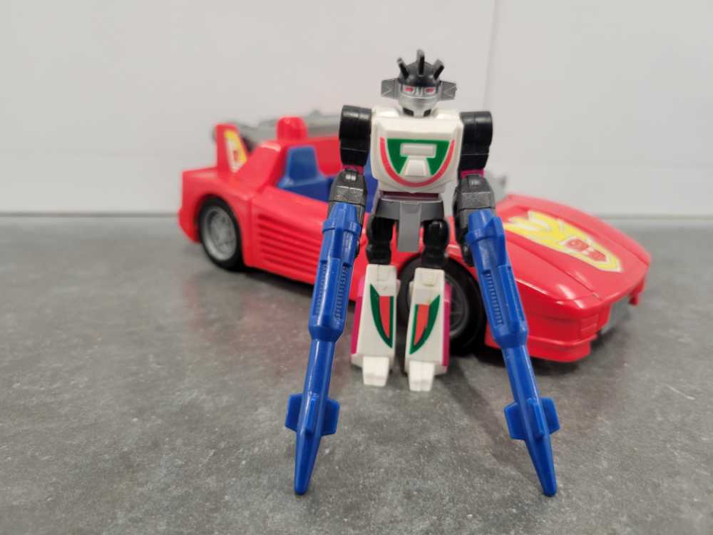 The Batman (Red Hue) Gold Label 12-Inch Statue Figure.