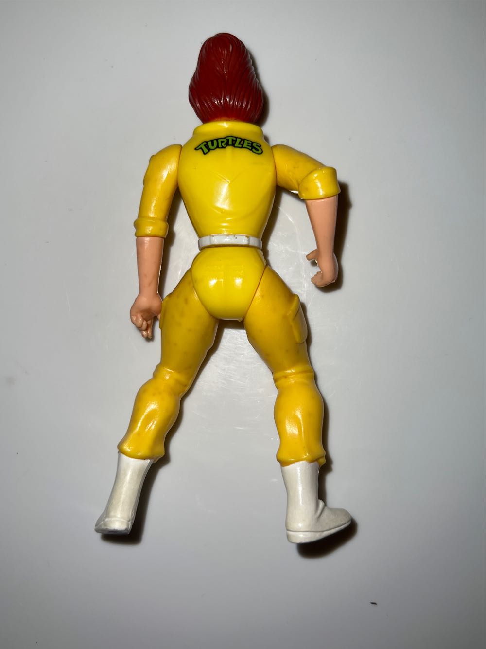 April O’Neil (Orange & Blue Stripes W/ Press Pass) - Playmates (Teenage Mutant Ninja Turtles (1988)) action figure collectible - Main Image 2