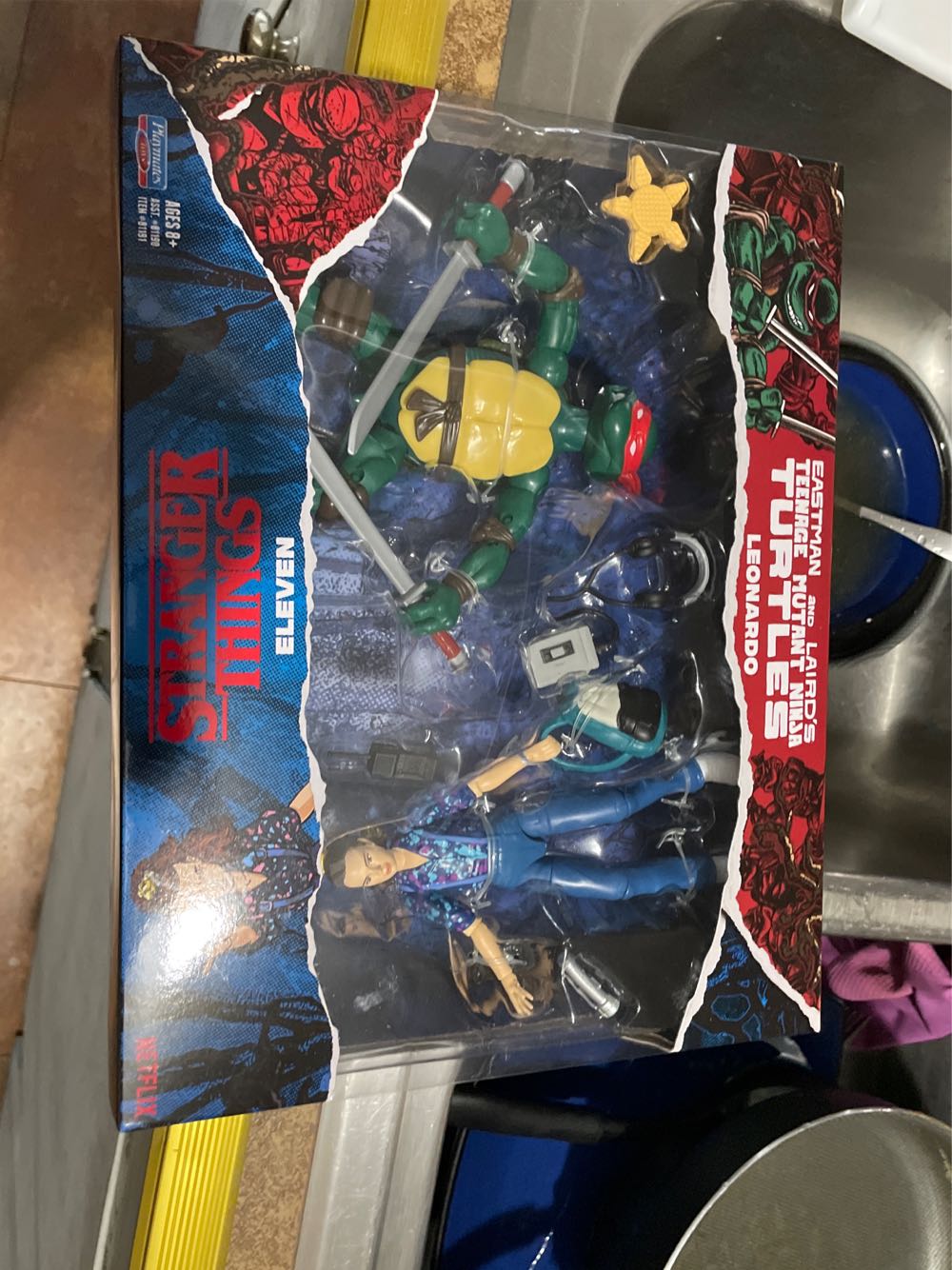 Playmates Toys TMNT and Stranger Things Leonardo & Eleven (2-Pack) - Playmates Toys (Playmates TMNT & Stranger Things) action figure collectible [Barcode 043377811916] - Main Image 1