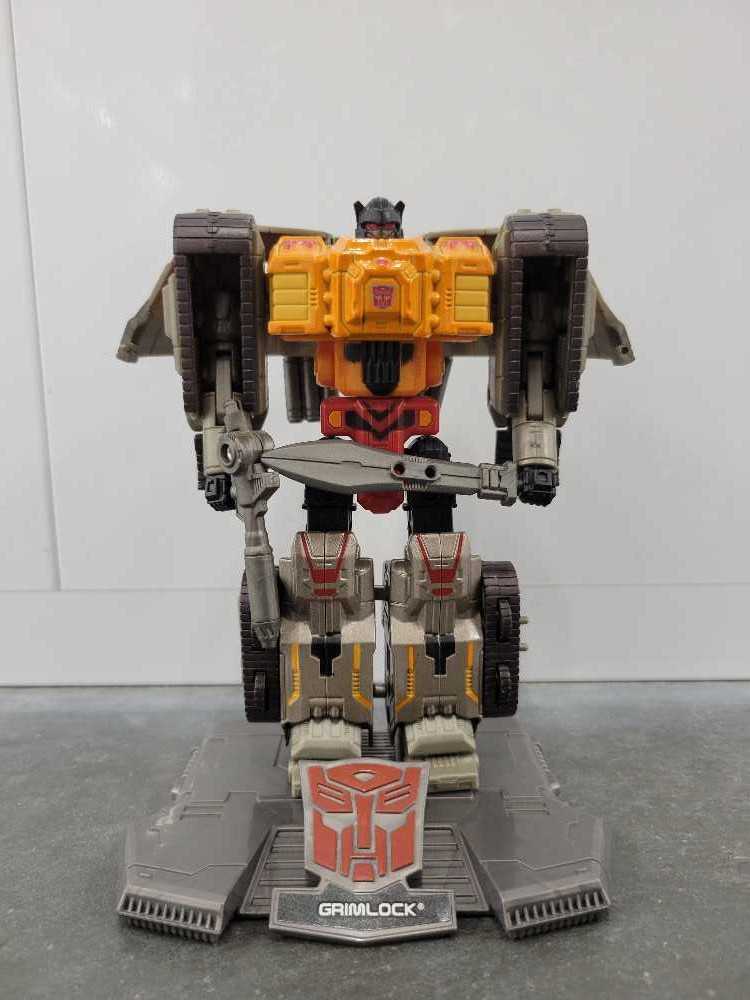 Grimlock, WWI The Robot Mode Toys"R"Us - Hasbro (Titanium) action figure collectible - Main Image 2