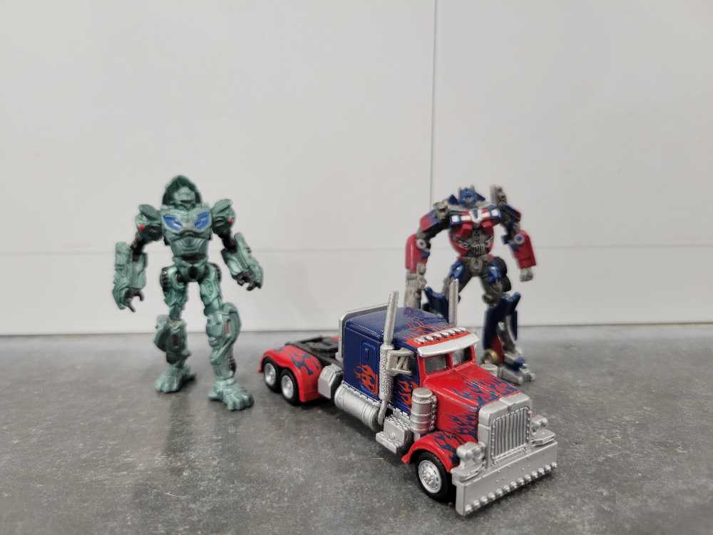 Optimus Prime Protoform Ultimate Optimus Prime 3 Pack Target - Hasbro (Titanium 3”) action figure collectible - Main Image 4