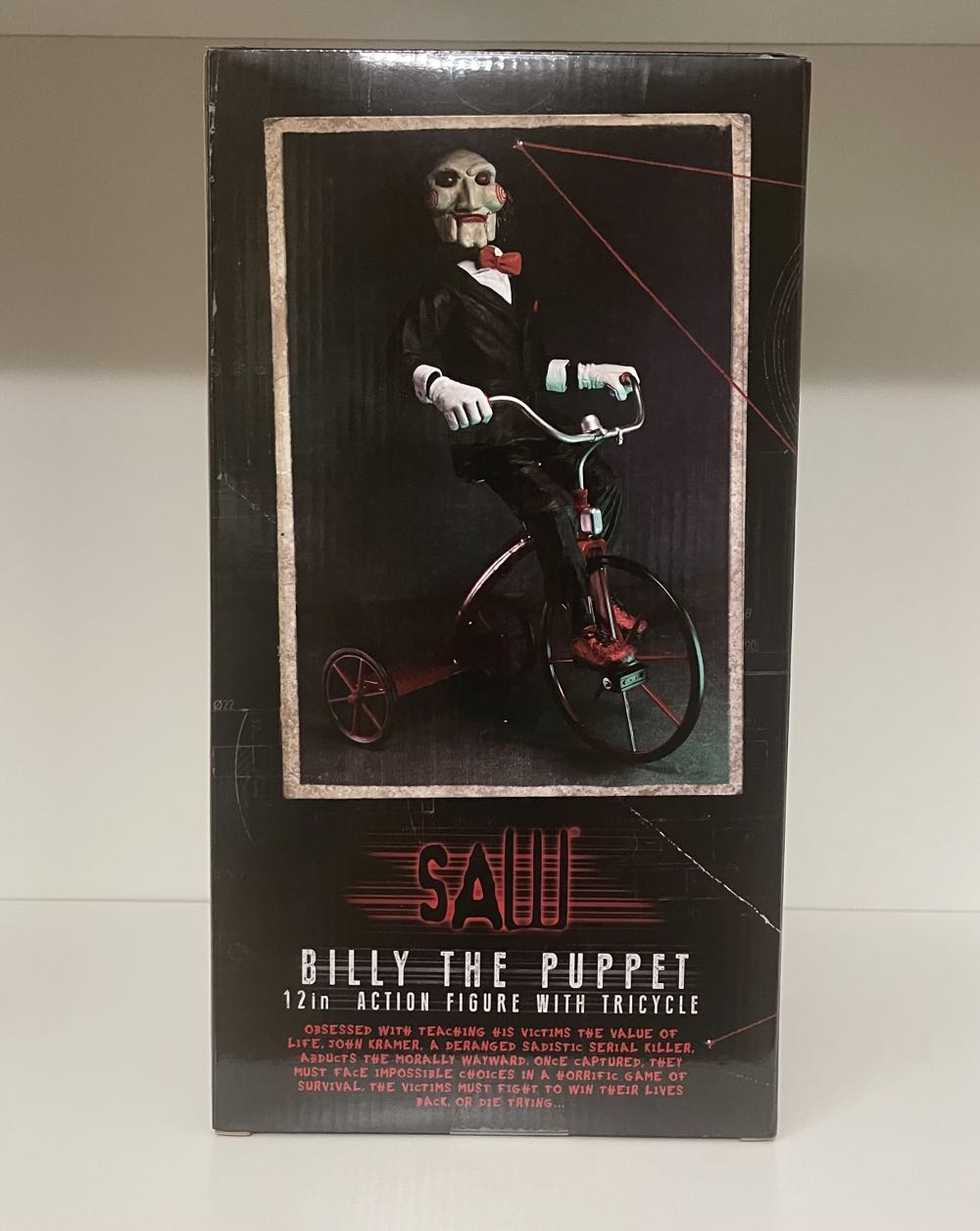 Saw Billy in Tricycle with Sound Neca 12 Inch Saw  5,120 ctb ( opis) - Neca/Reel Toys (Saw) action figure collectible [Barcode 634482606070] - Main Image 2