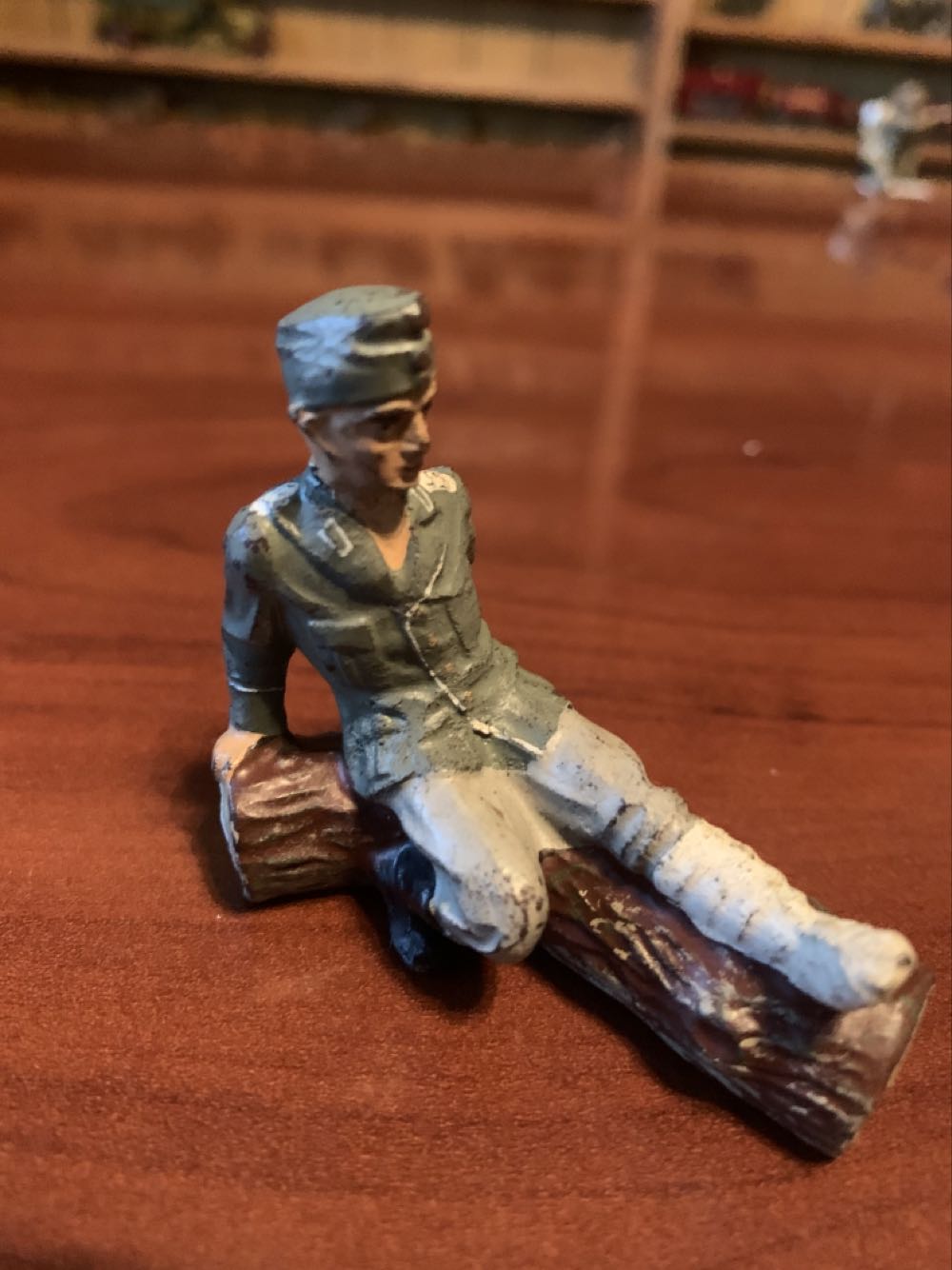 Lineol German Wounded Sitting Log - Lineol (German) action figure collectible - Main Image 1