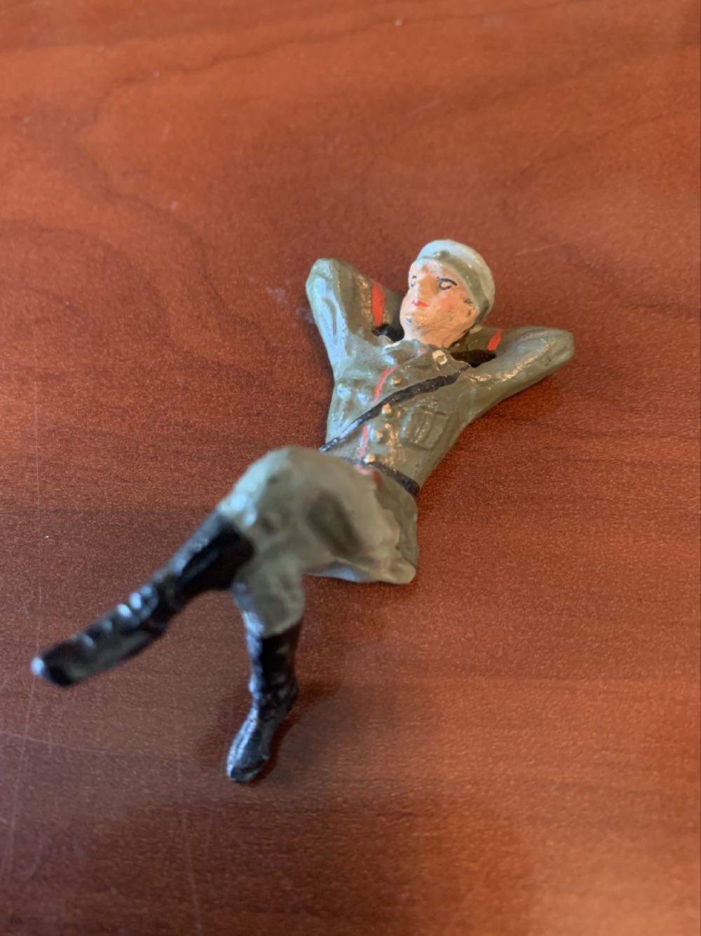 Unmarked German Relaxing On Back - Unmarked (German) action figure collectible - Main Image 1