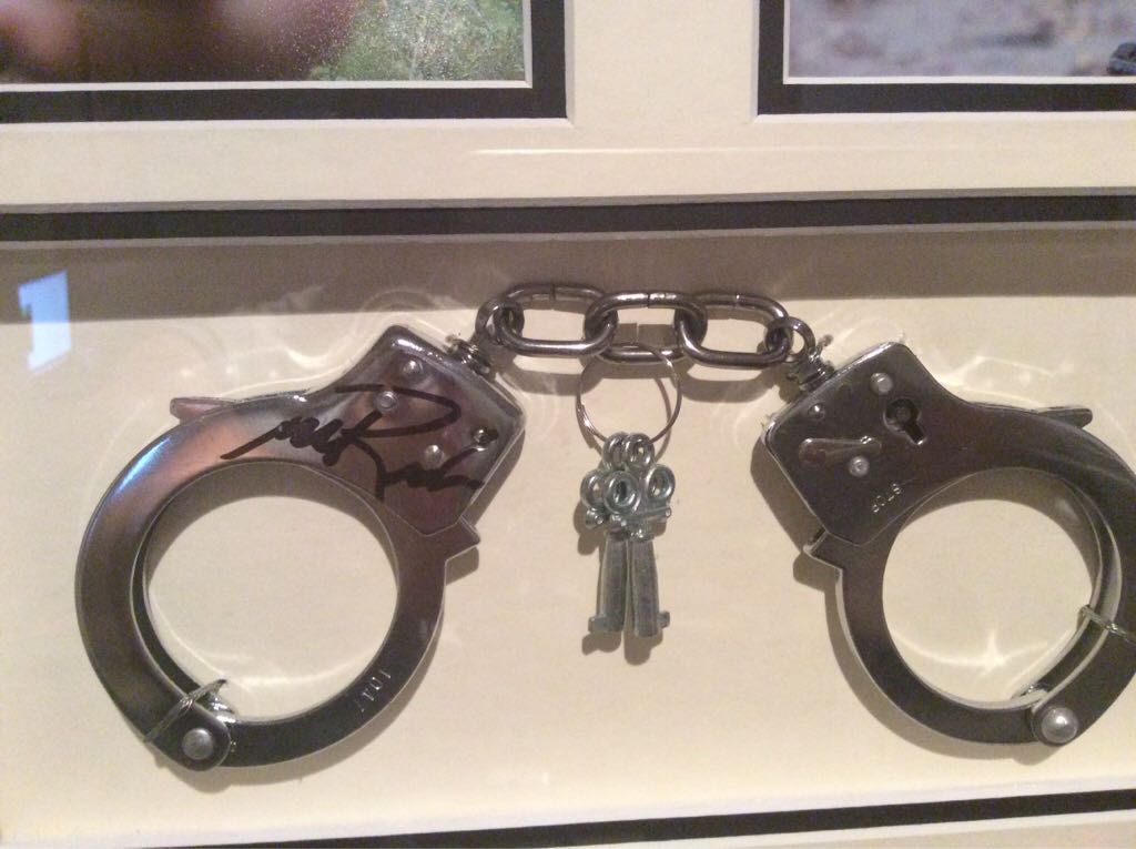 The Walking Dead Daryl Dixon Autographed Arrow And Merle Dixon Autographed Handcuffs  action figure collectible - Main Image 2