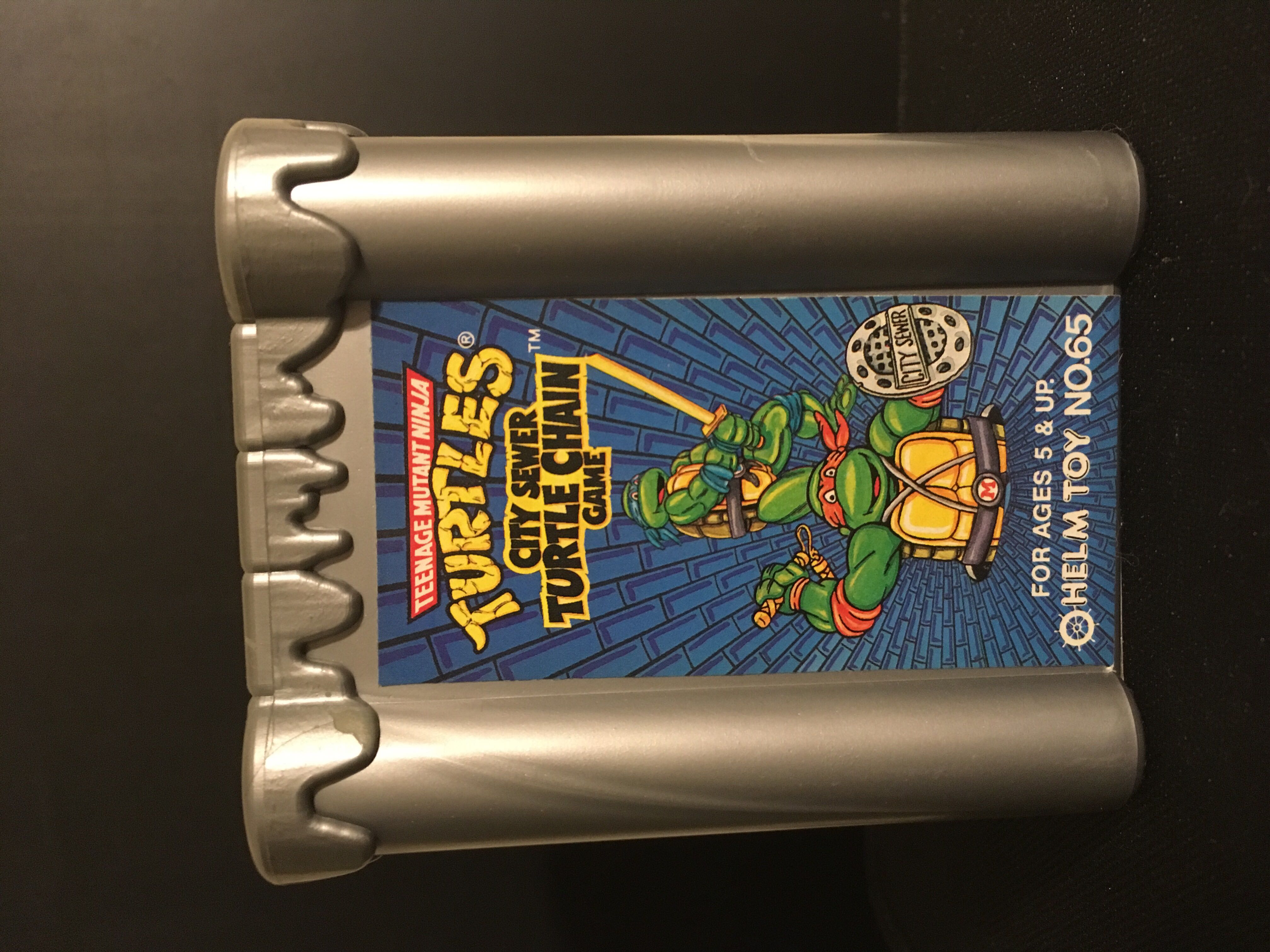 Teenage Mutant Ninja Turtles City Sewer Turtle Chain Game  - Helm Products action figure collectible [Barcode 047931000655] - Main Image 2