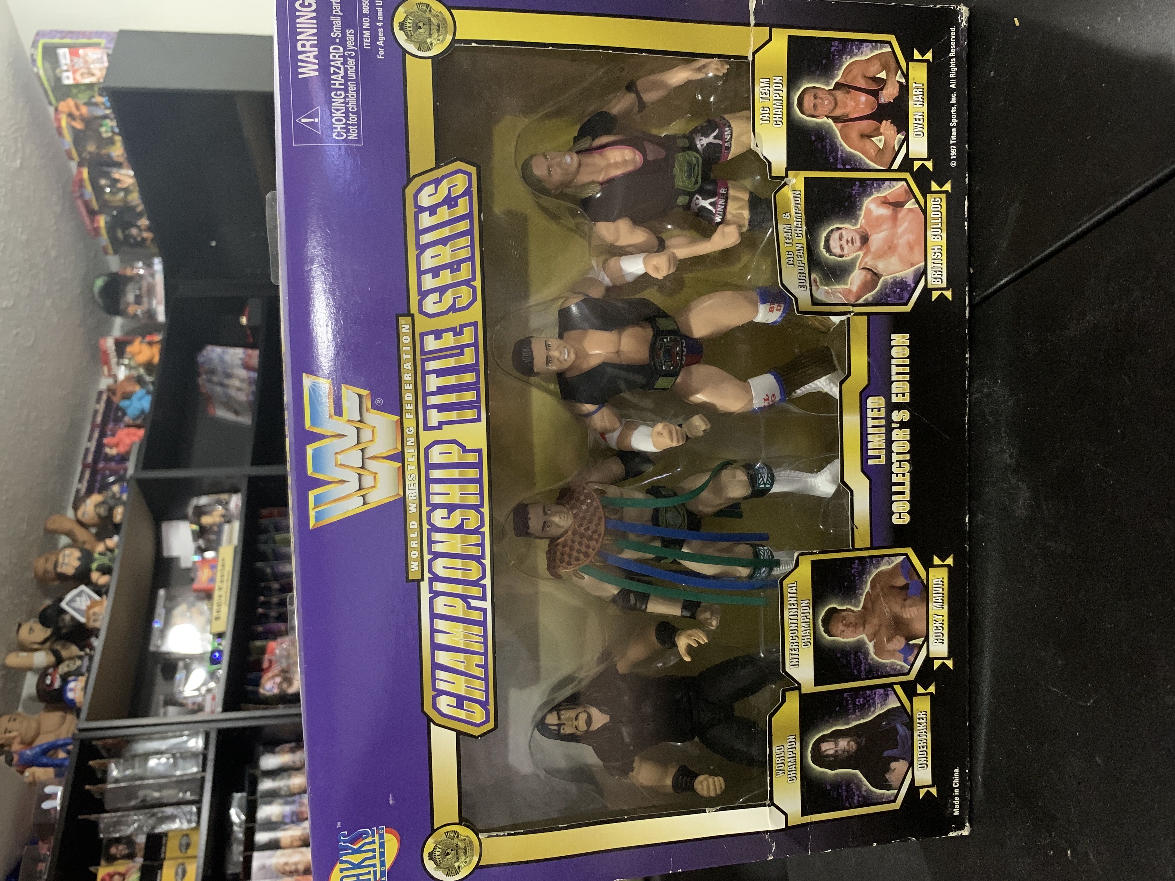 WWF Jakks Pacific BCA Toys ‘R Us Exclusive Championship Title Series Special Edition Collector’s Boxed Set 4 Pack: The Undertaker, Rocky Maivia, British Bulldog, & Owen Hart (“European” Variant) - WWF Jakks Pacific BCA (WWF Jakks Pacific BCA Toys ‘R Us Exclusive Championship Title Series Special Edition Collector’s Boxed Set 4 Pack) action figure collectible [Barcode 039897805085] - Main Image 1