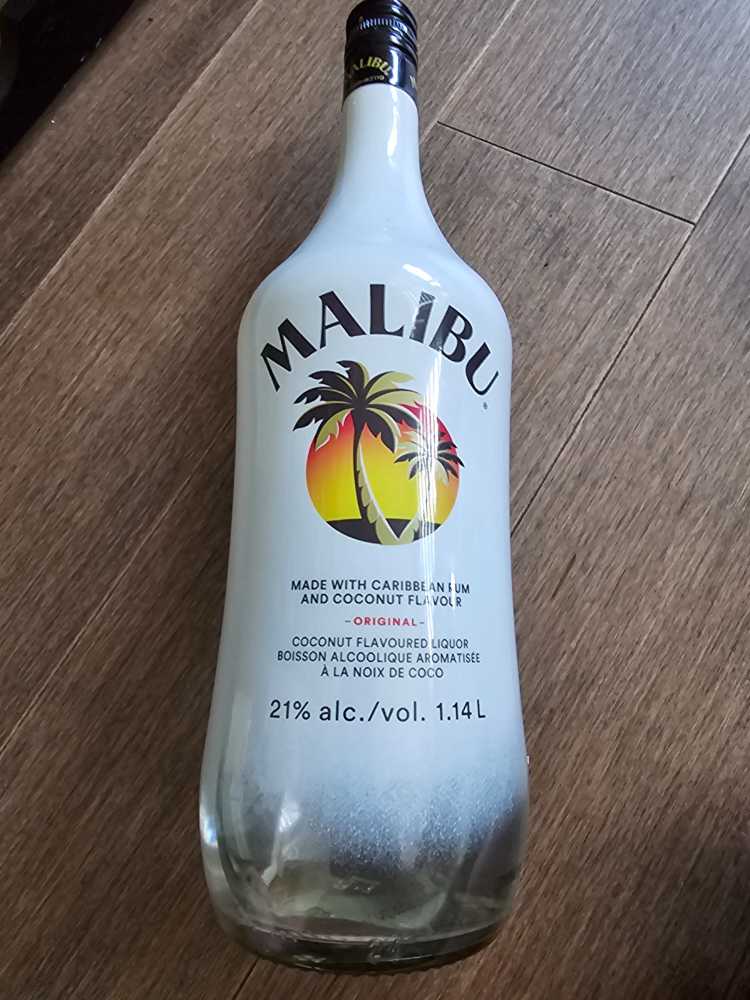 Malibu Rum Coconut  - Hiram Walker & Sons (1.14 L) alcohol collectible [Barcode 089540448954] - Main Image 2