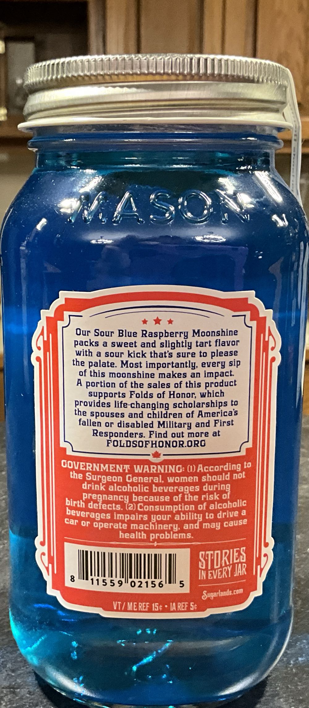 Sugarlands Shine - Sour Blue Raspberry - Folds Of Honor - Sugarlands Distilling Company in Gatlinburg, Tennessee (750 mL) alcohol collectible [Barcode 811559021565] - Main Image 2