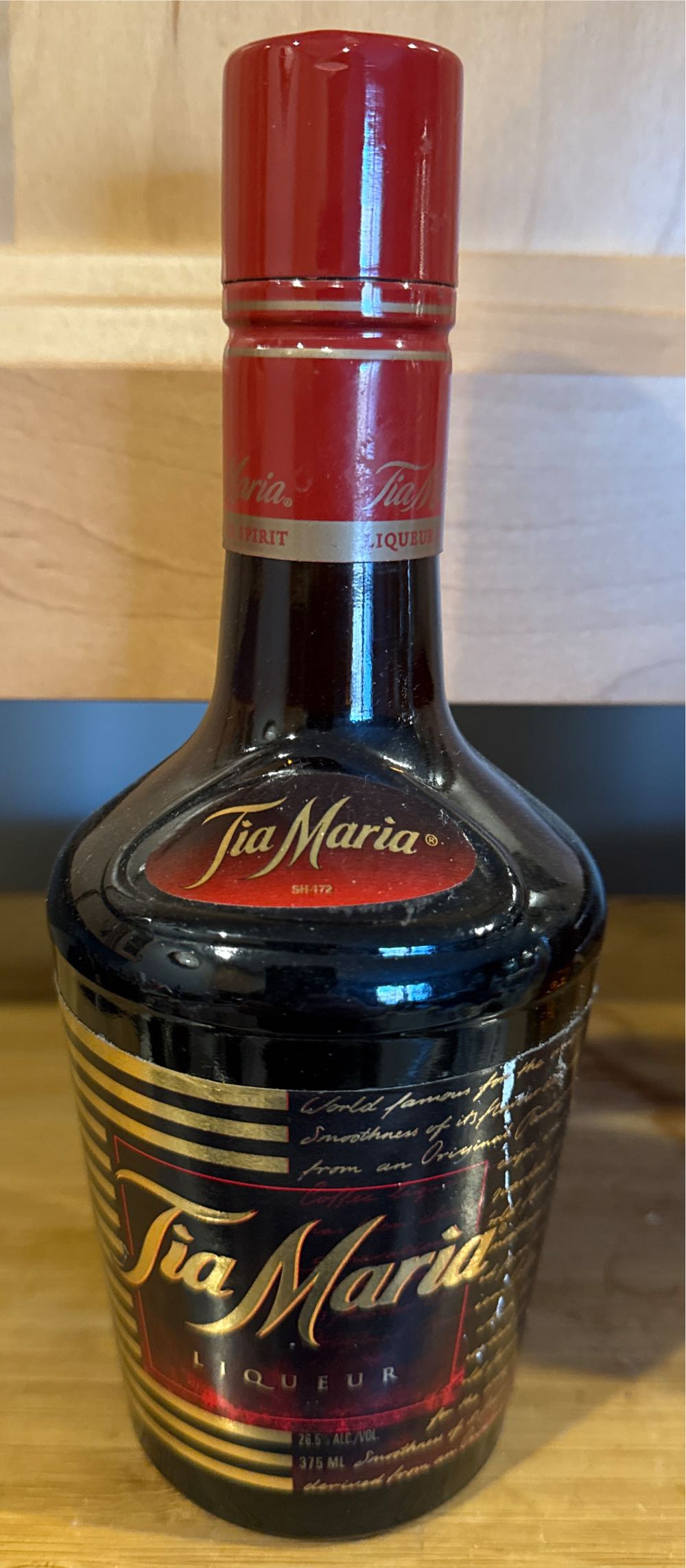 Wapenschild (wit) + Duvel Rood (oude tekst) 
+ bol + Gouden rand + kleine ronde krul @ letter L