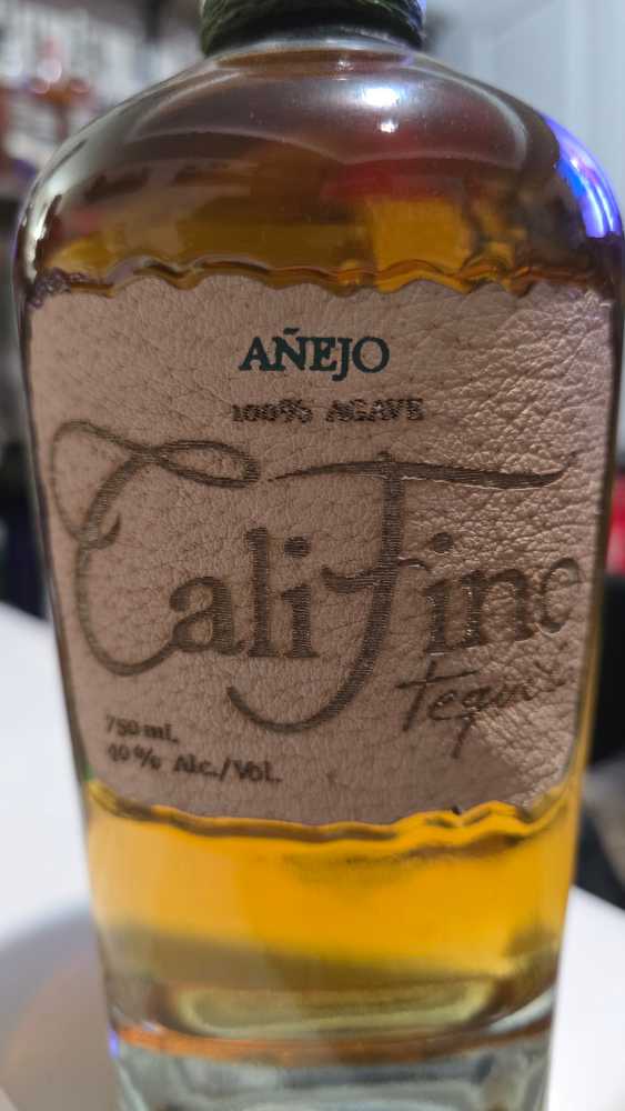 Califino Anejo Tequila - NOM 1514 (750 mL) alcohol collectible [Barcode 867042000319] - Main Image 2