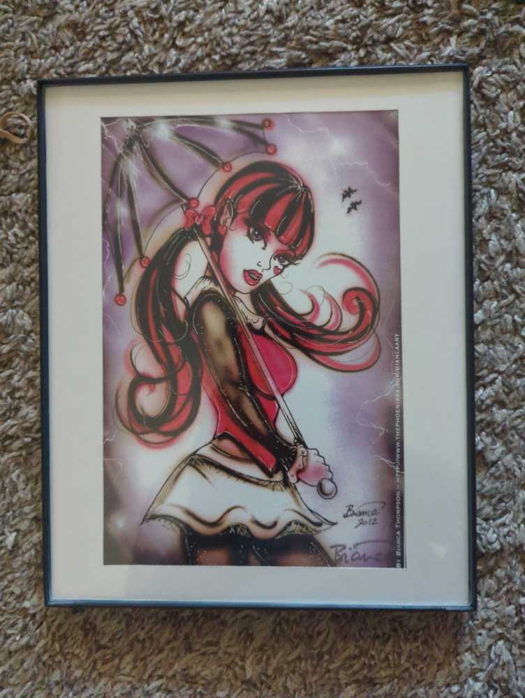 Girl Reading Red Book with Dog