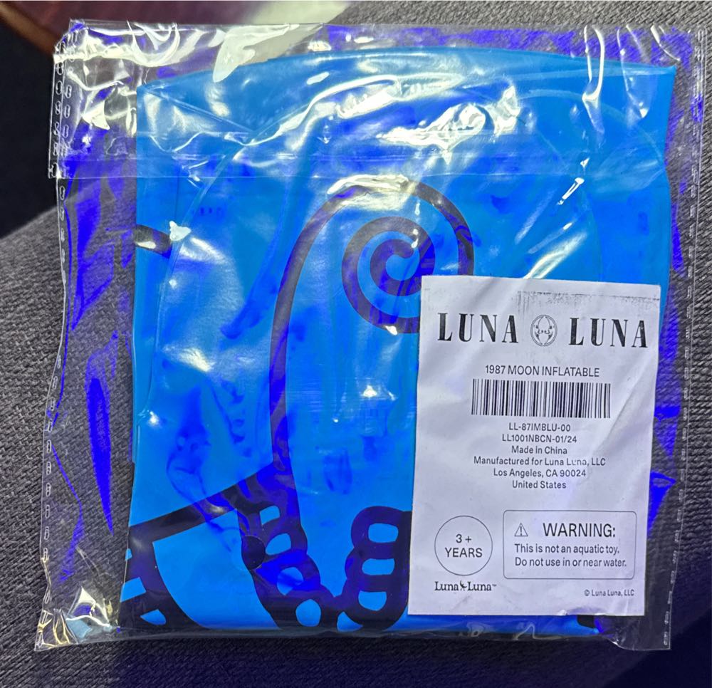 Hunter With Seal And Inuksuk