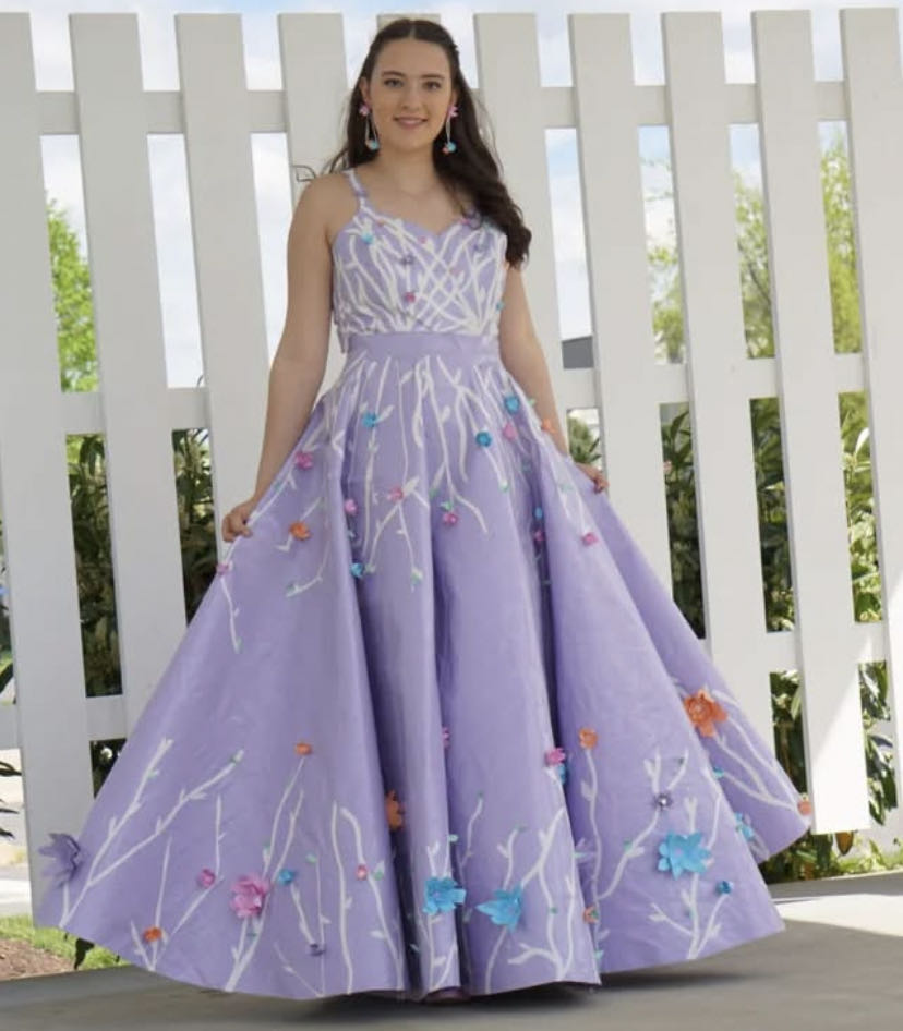 Ghana Three Figures Holding A Globe