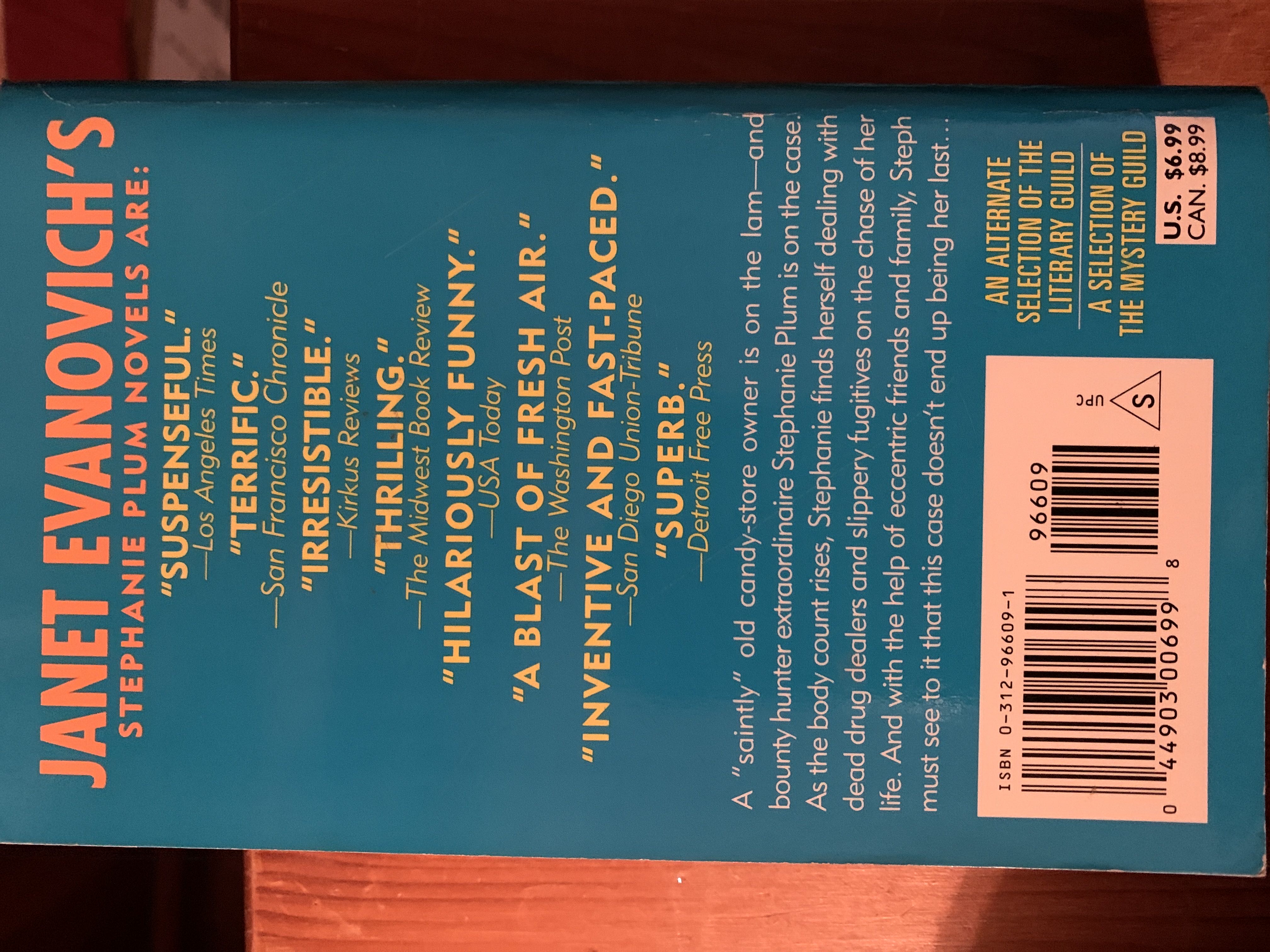 Three To Get Deadly - Janet Evanovich (St. Martin Press - Mass Market Paperback) book collectible [Barcode 9780312966096] - Main Image 2