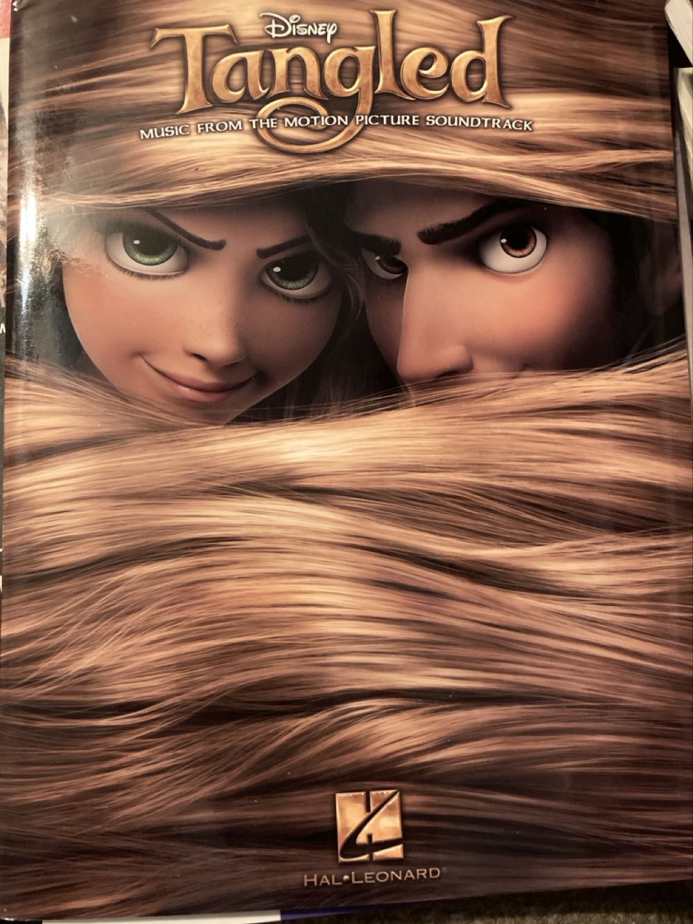 Movie - Tangled - Various (Hal Leonard Publishing Corporation - Paperback) book collectible [Barcode 9781617741111] - Main Image 1