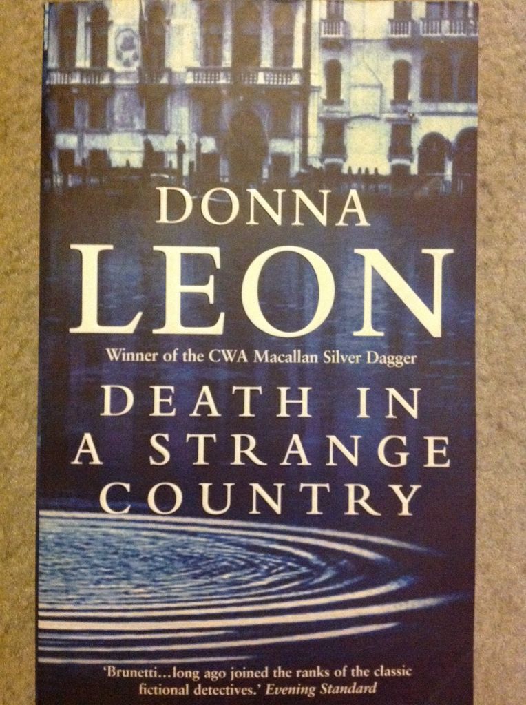 Death In A Strange Country - Leon, Donna (Arrow - Paperback) book collectible [Barcode 9780099469377] - Main Image 1