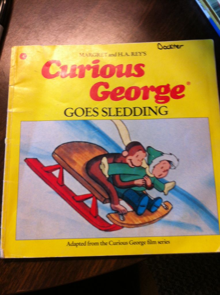 Curious George Goes Sledding