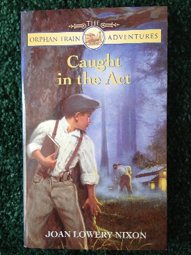 Orphan Train Adventures #2: Caught in the Act - Joan Lowery Nixon (Laurel Leaf - Paperback) book collectible [Barcode 9780440226789] - Main Image 1