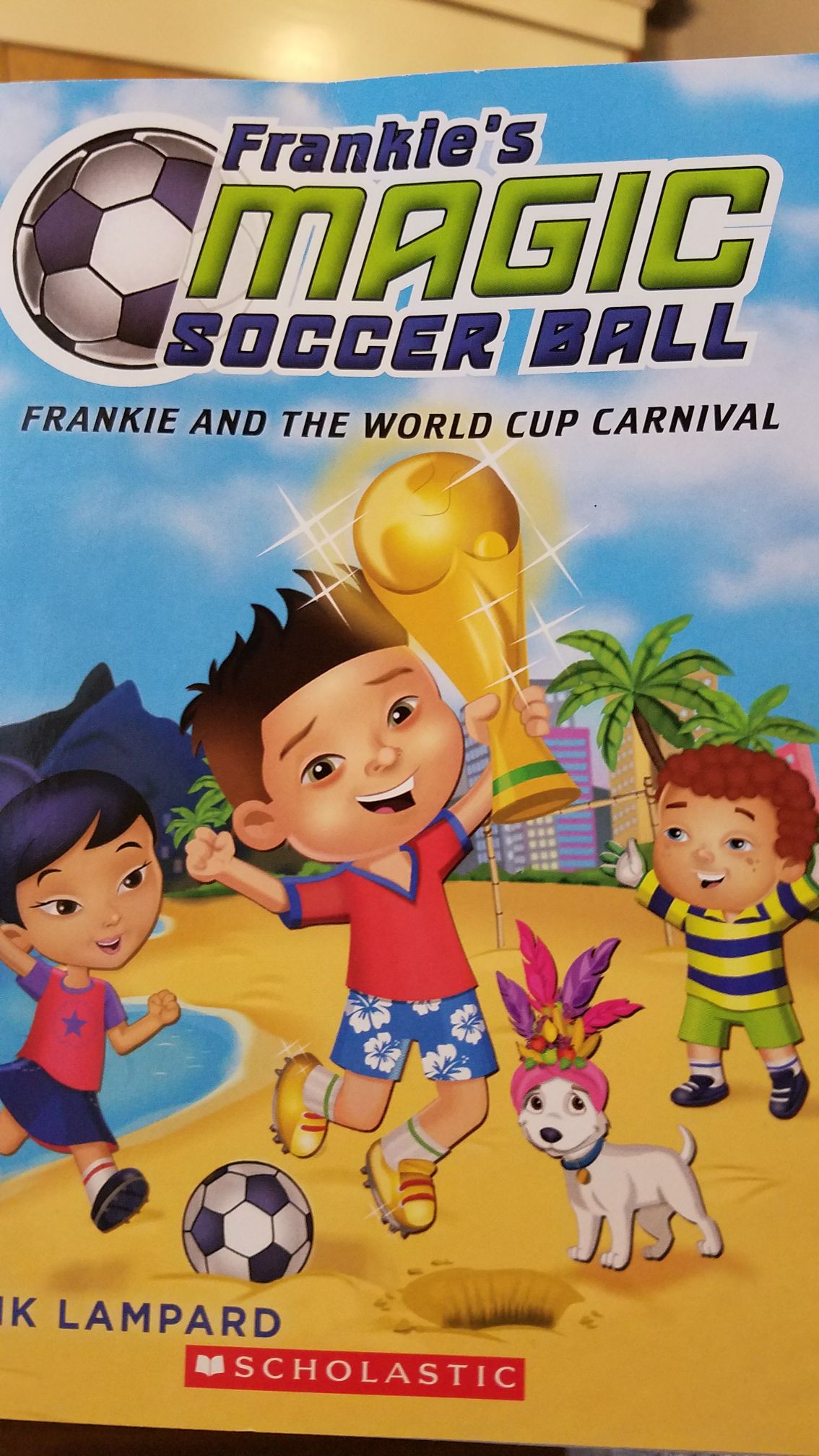 Frankie’s Magic Soccer Ball: Frankie and the World Cup Carnival - Frank Lampard (Scholastic, Inc - Paperback) book collectible [Barcode 9781338089103] - Main Image 1
