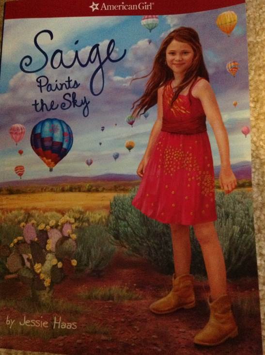 American Girl 2013: Saige: Saige Paints The Sky - Jessie Haas (American Girl Publishing Incorporated - Paperback) book collectible [Barcode 9781609581688] - Main Image 1