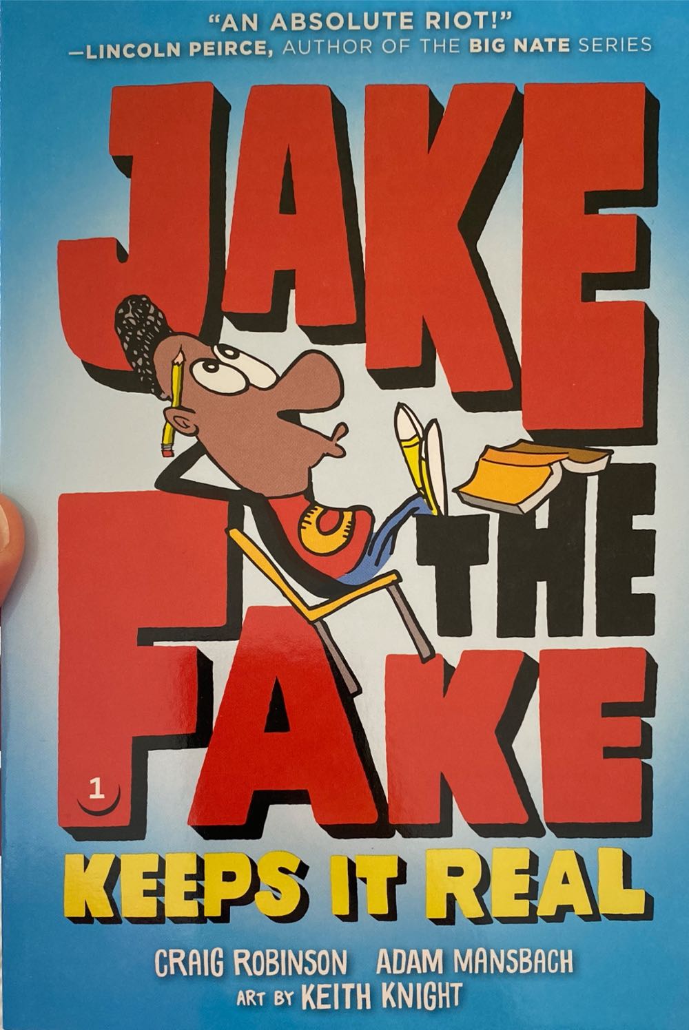 Jake the Fake Keeps it Real - Craig Robinson (- Paperback) book collectible [Barcode 9781338321043] - Main Image 1