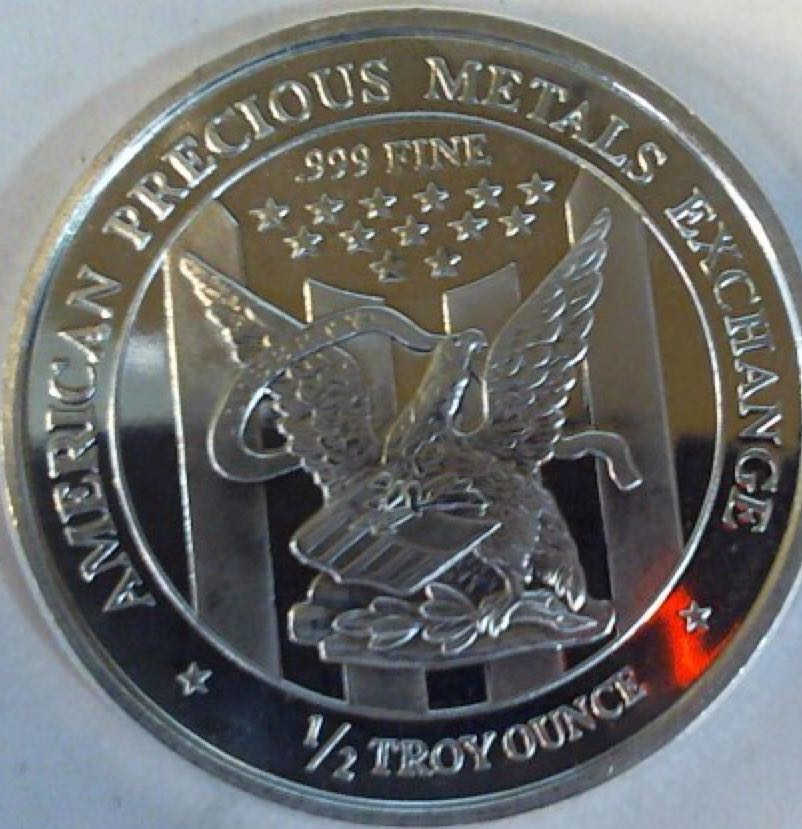 Book - Canadian Nickel 50 Cent Coin