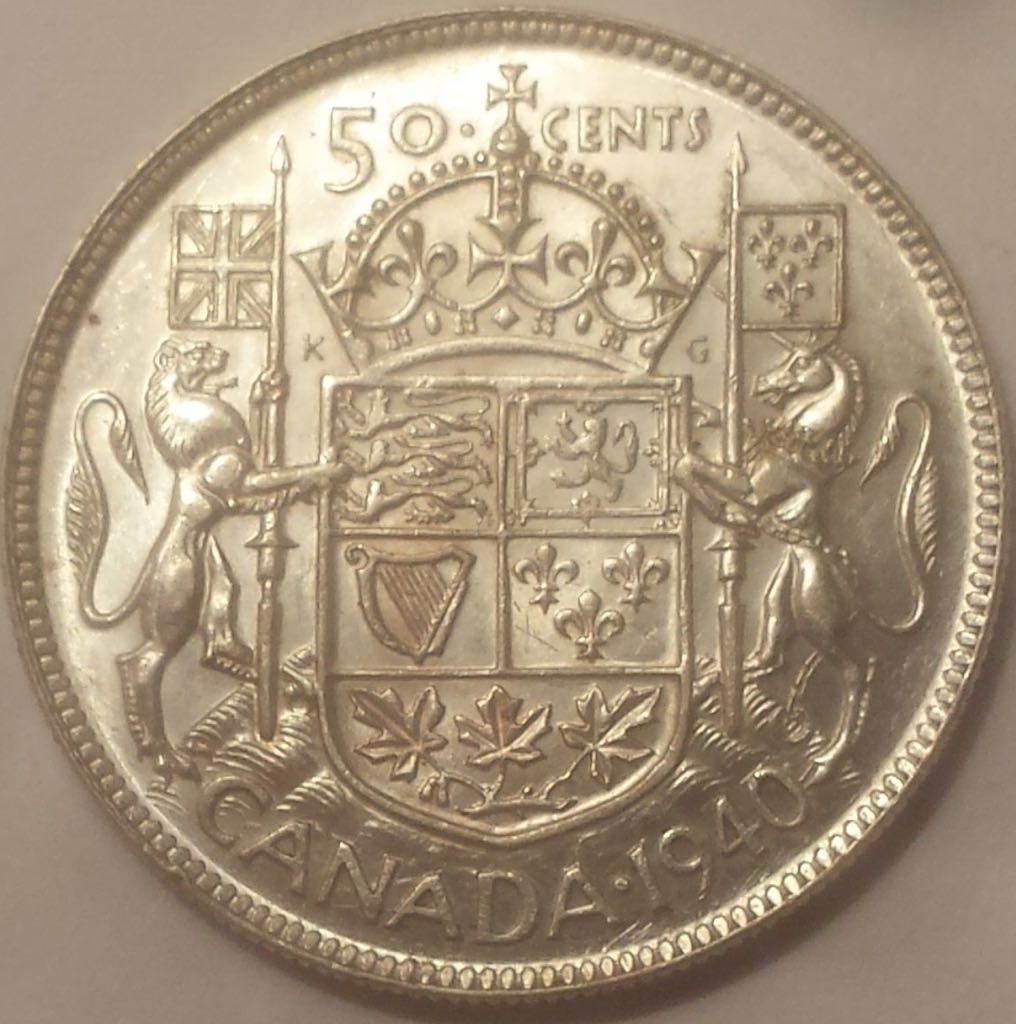 Book - Canadian Silver 25 Cent Coin