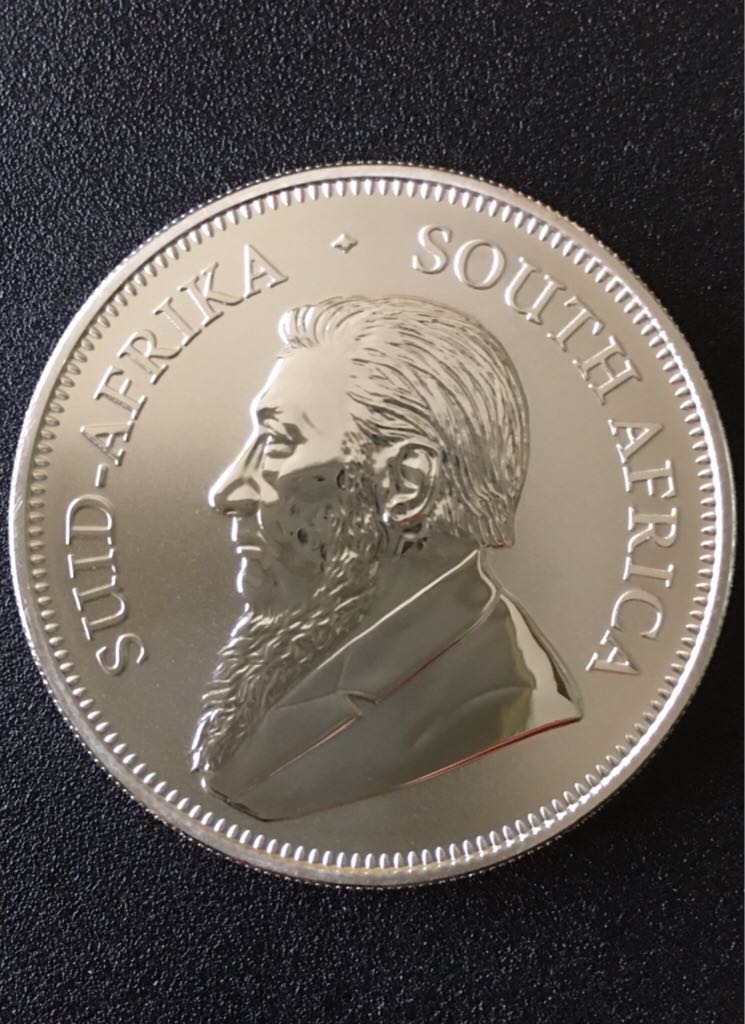Book - Canadian Silver Dollar