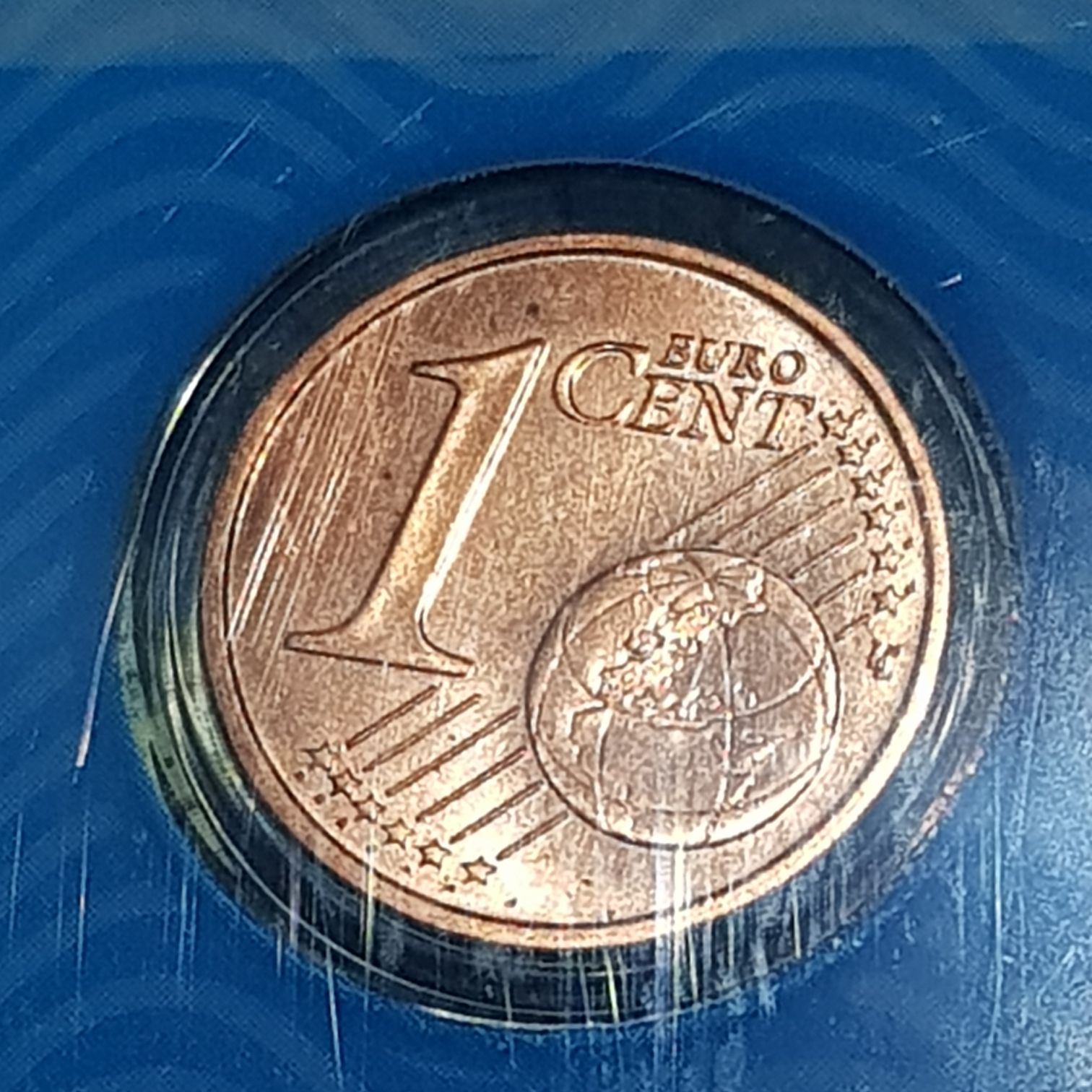 1 Peseta