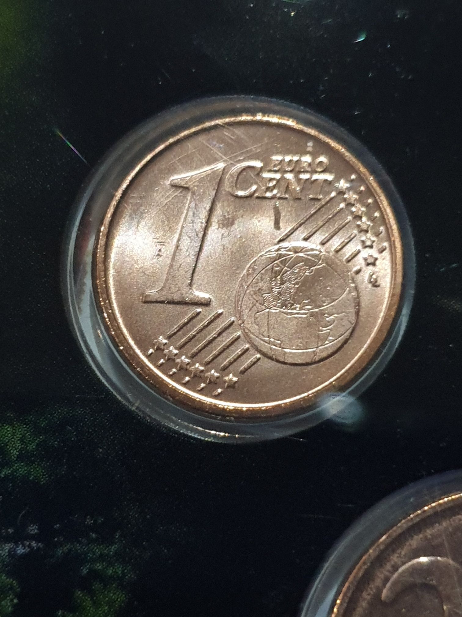 1 Peseta