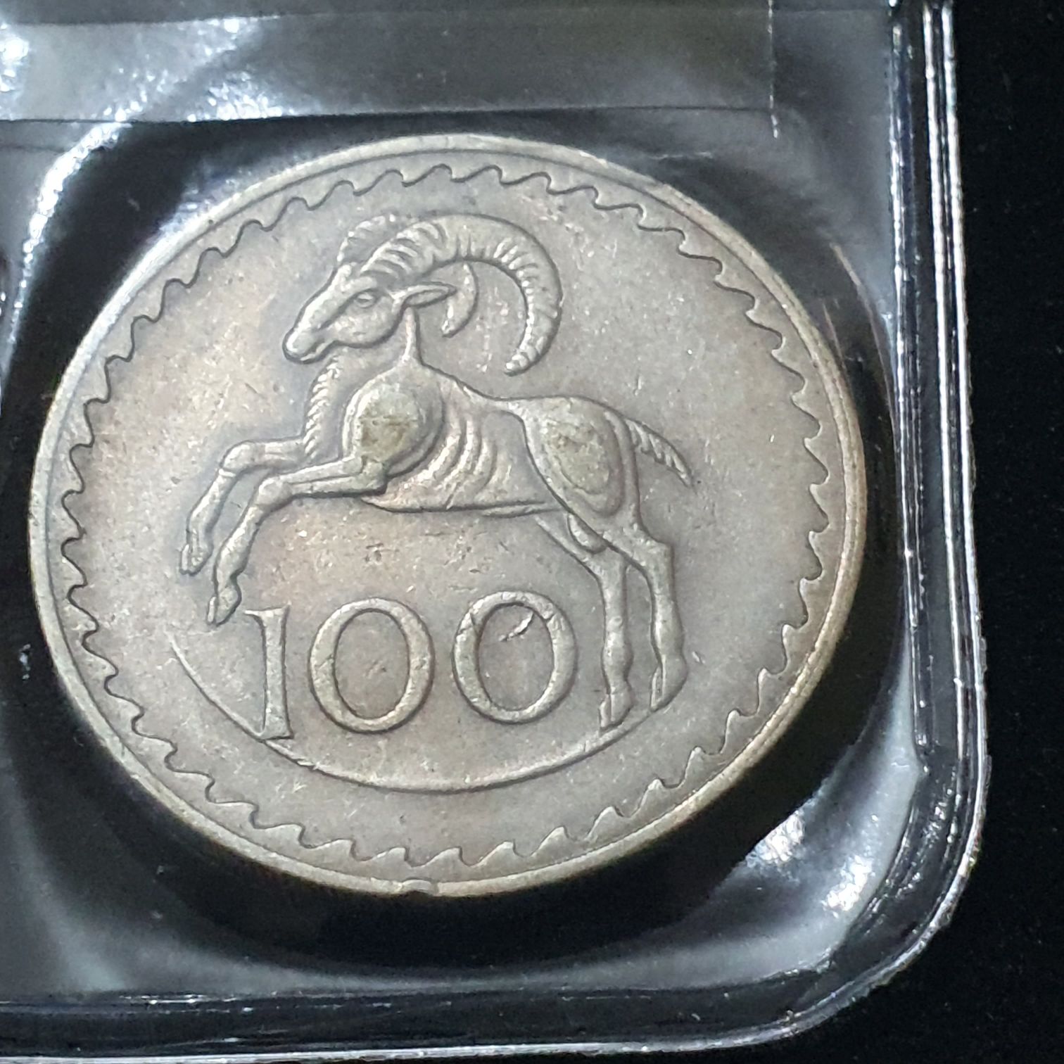 100 Mils  coin collectible - Main Image 1
