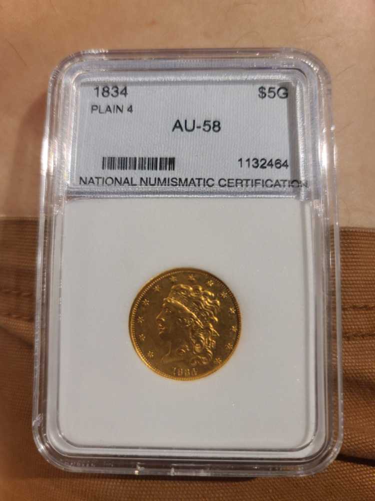 50 Cents (ribbon downwards)