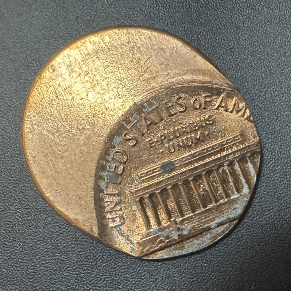 Error Strike Off Center  coin collectible - Main Image 2
