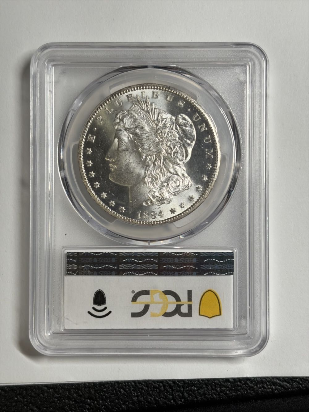 1884-CC Morgan Silver Dollar (Planchet Lamination Mint Error) PCGS MS64  coin collectible [Barcode 58771377] - Main Image 2
