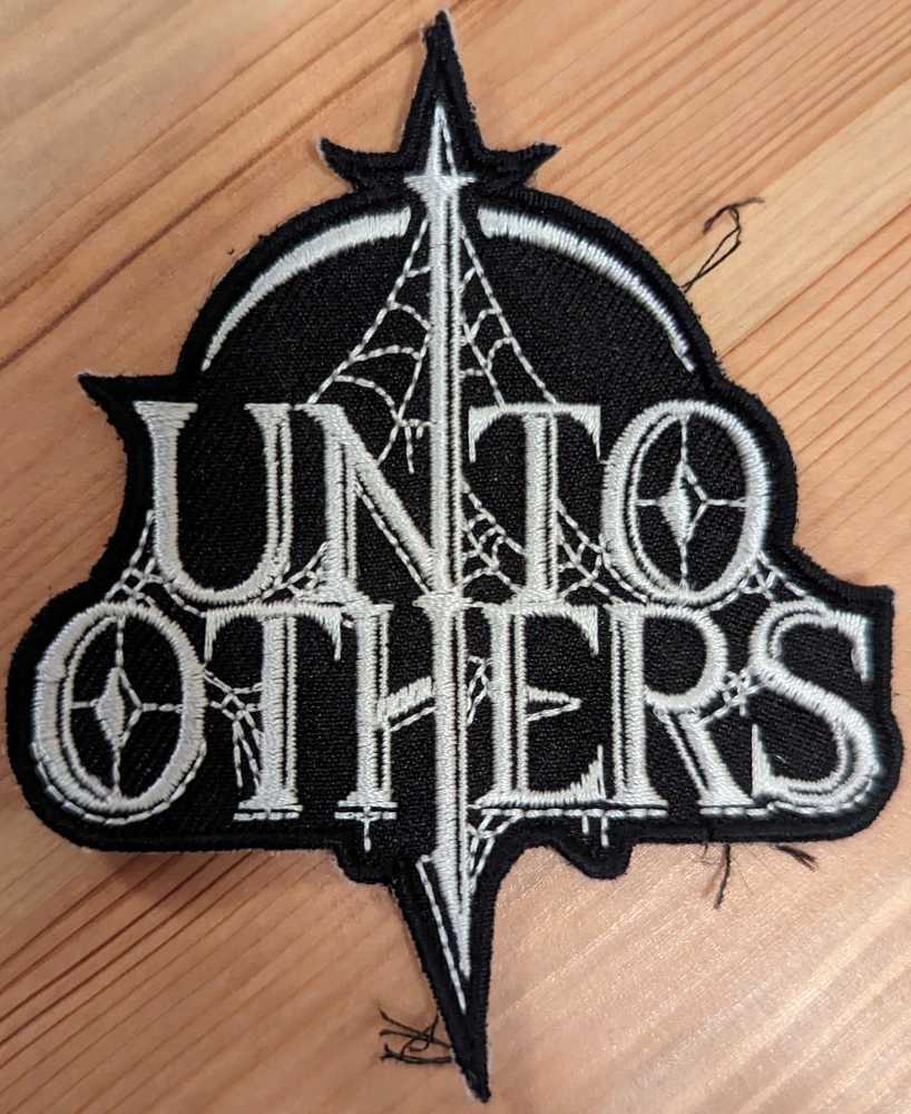 Unto Others - Logo