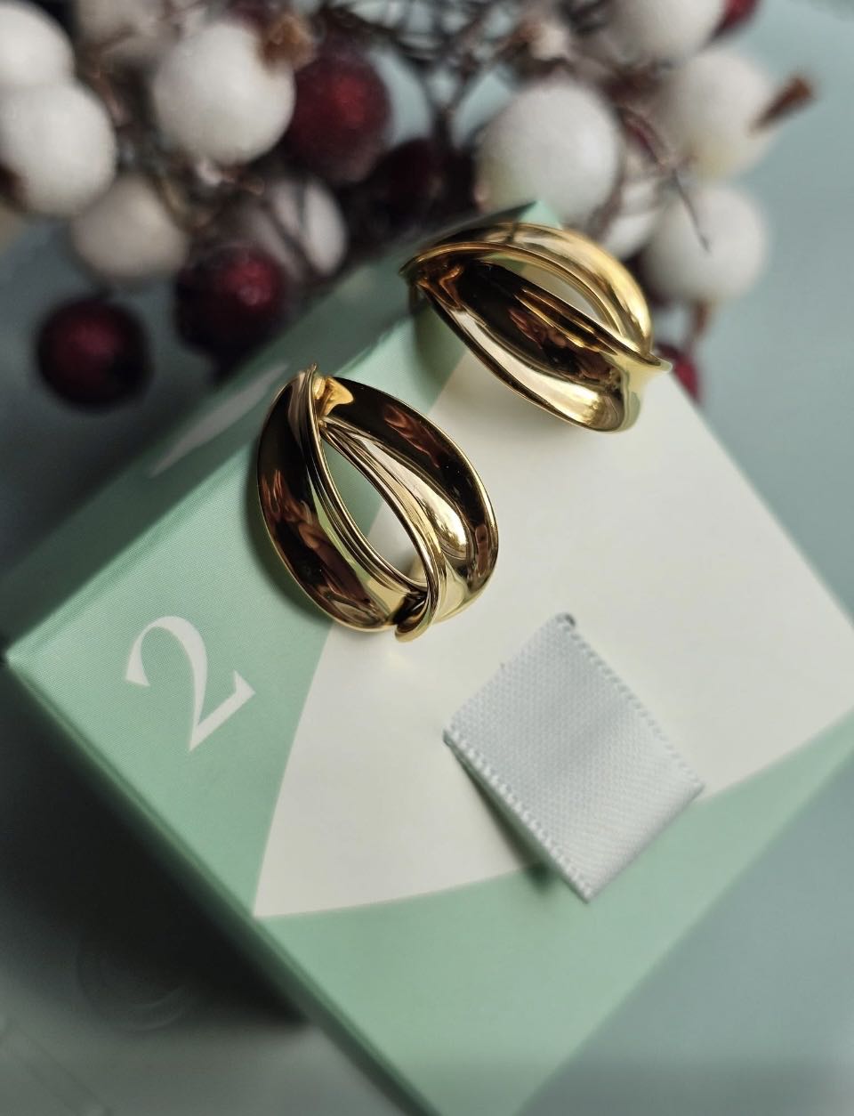 AK25 Gedrehte Ohrstecker