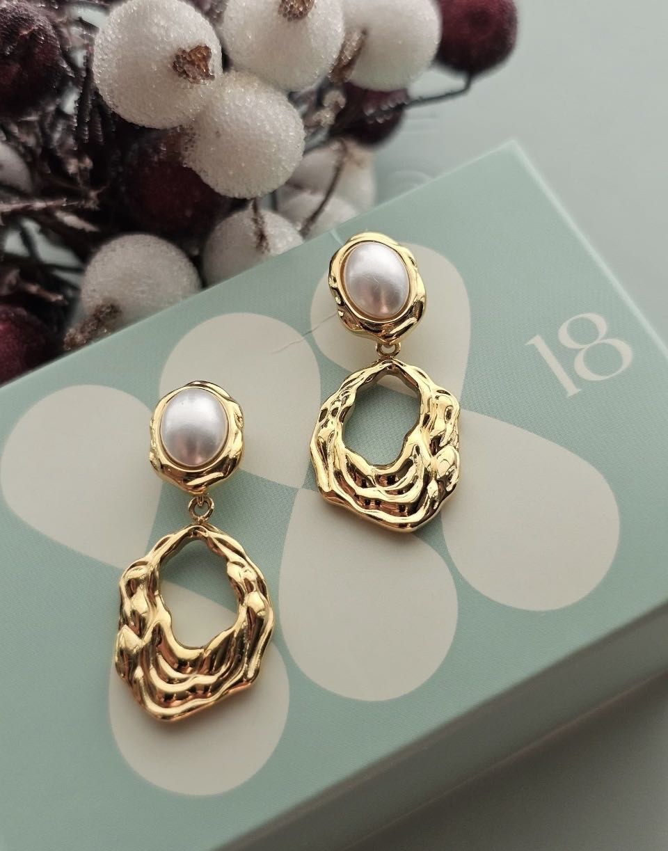 AK25 Muschel Ohrstecker