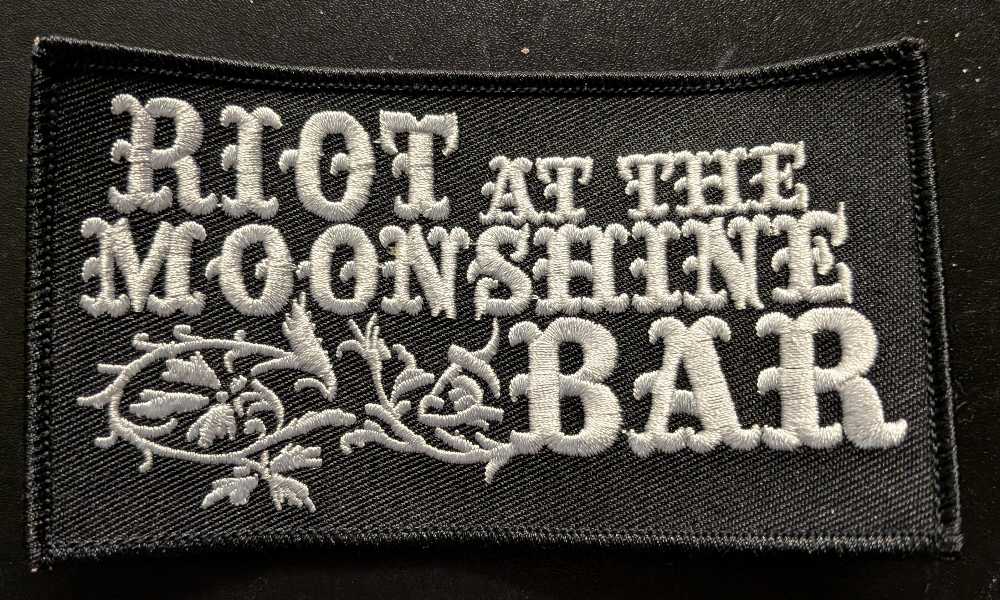 Riot At The Moonshine Bar - Logo