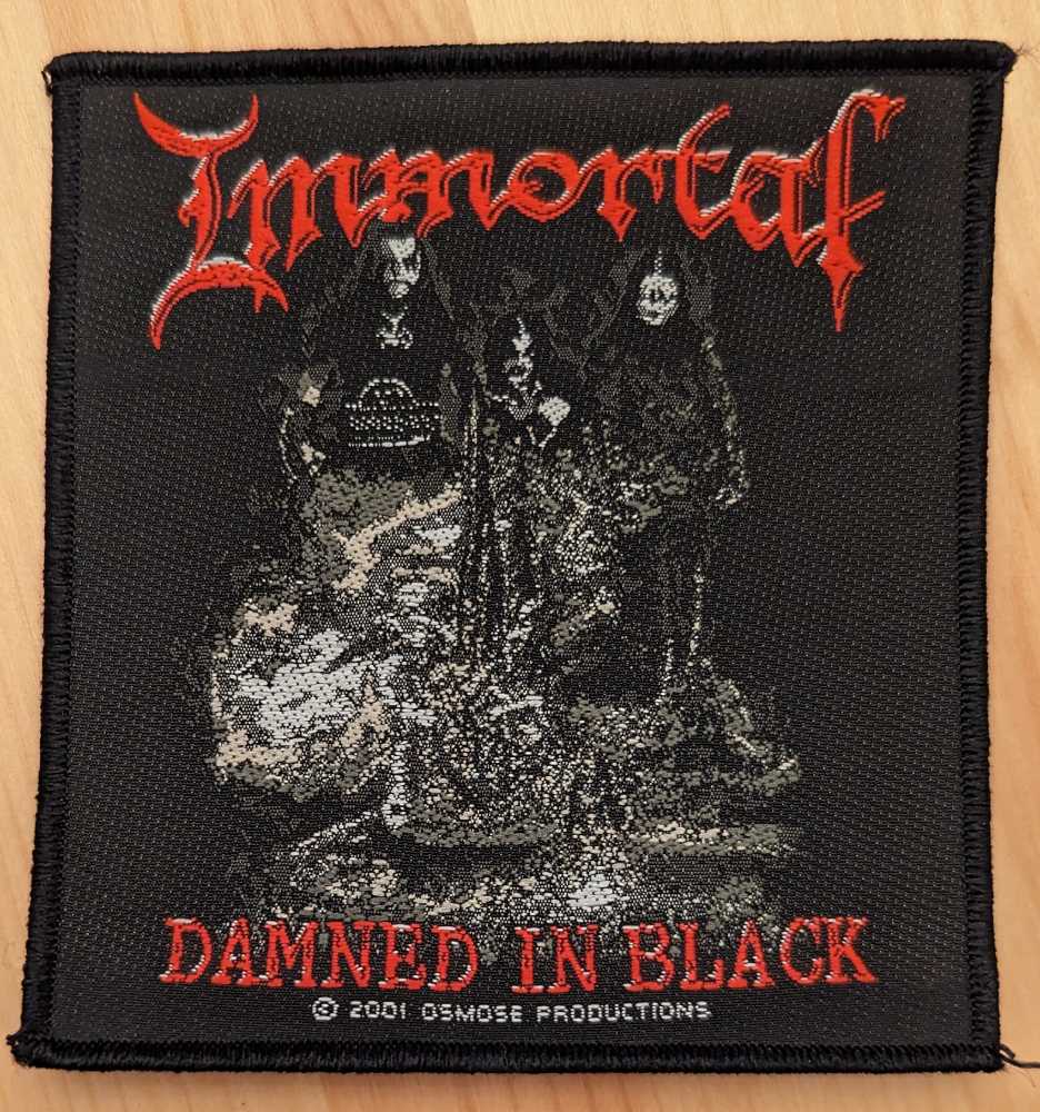 Immortal - Damned In Black