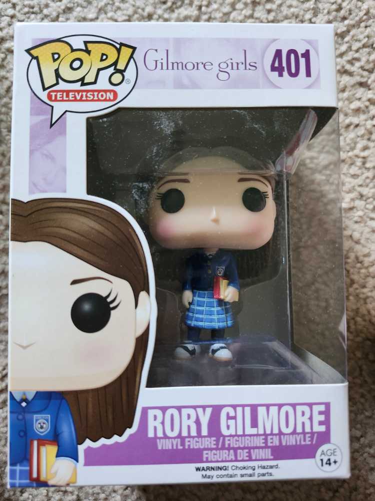 Superman salt and pepper shakers shaped like a foam booth with a Superman figure inside On Stand