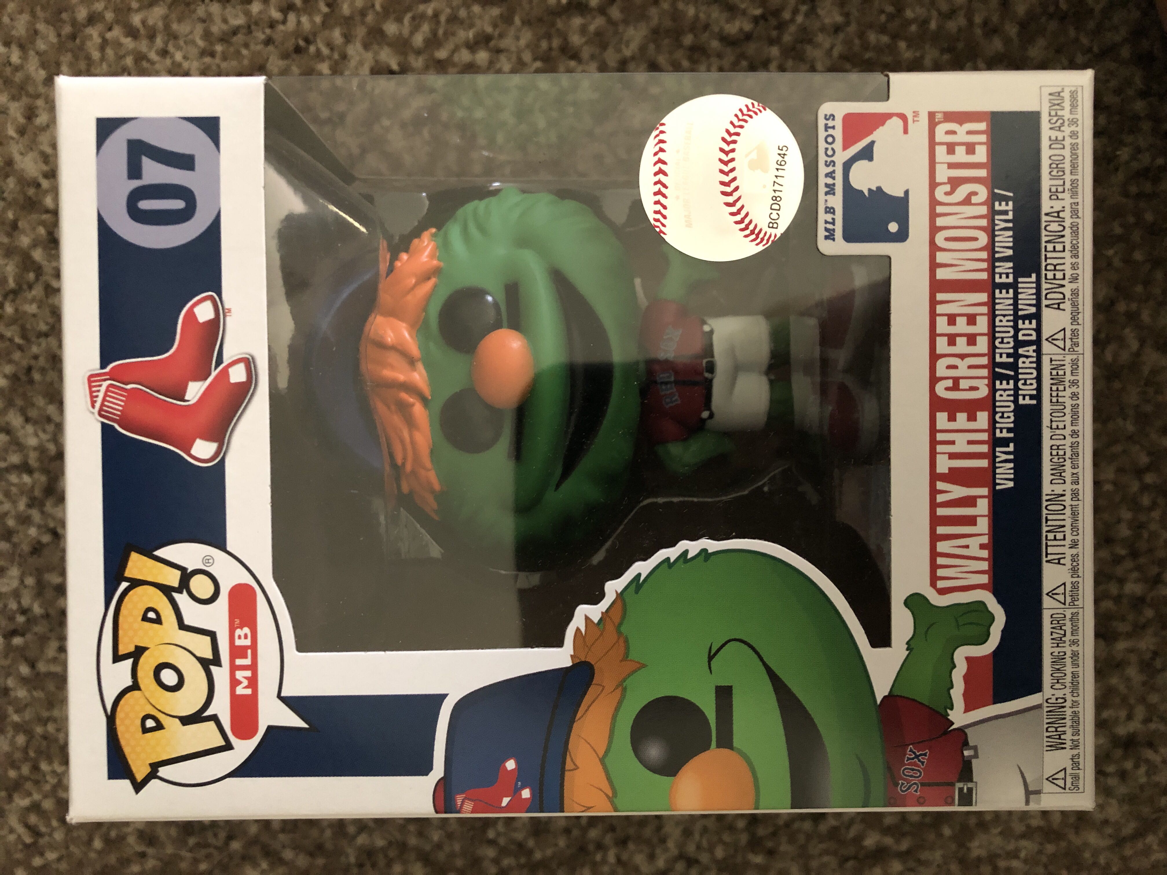 Cat Holding Kitty From A Bag