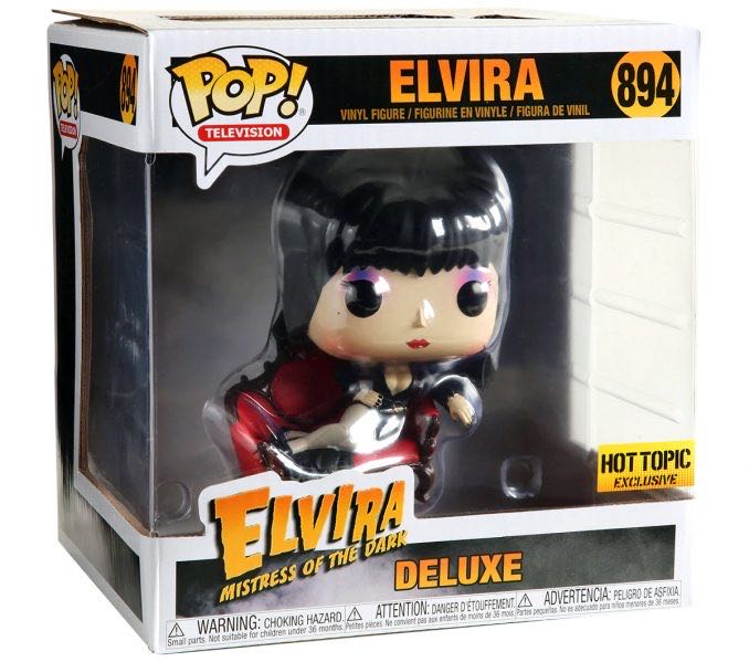 Elvira: Elvira (on Sofa) - Elvira Mistress of the Dark vinyl figure collectible [Barcode 11942319] - Main Image 2
