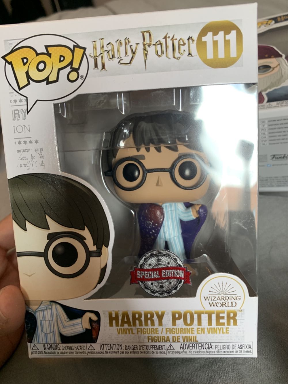 Harry Potter (Partial Invisibility Cloak) - Harry Potter vinyl figure collectible [Barcode 889698480642] - Main Image 1