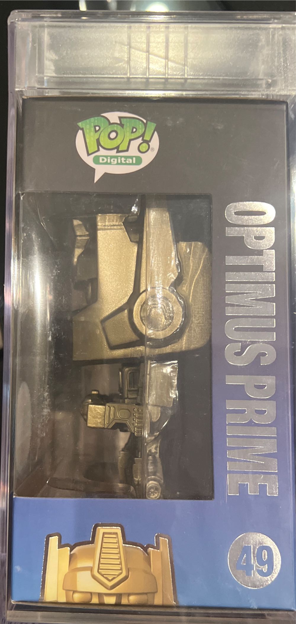 Optimus Prime (Gold) (NFT) - Transformers vinyl figure collectible [Barcode 889698677585] - Main Image 3