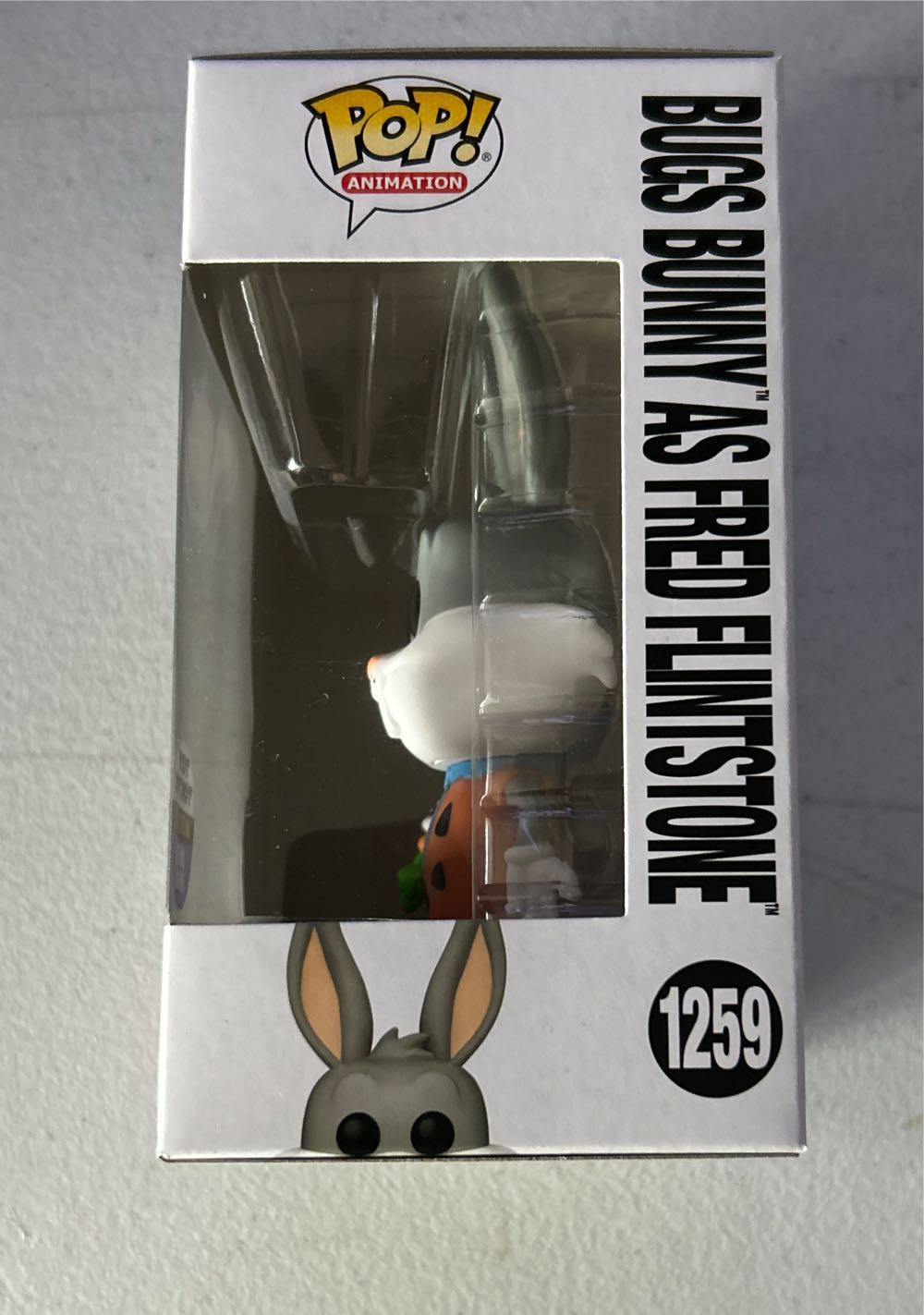 Bugs Bunny: as Fred Flintstone - Warner Bros. vinyl figure collectible [Barcode 889698702836] - Main Image 2