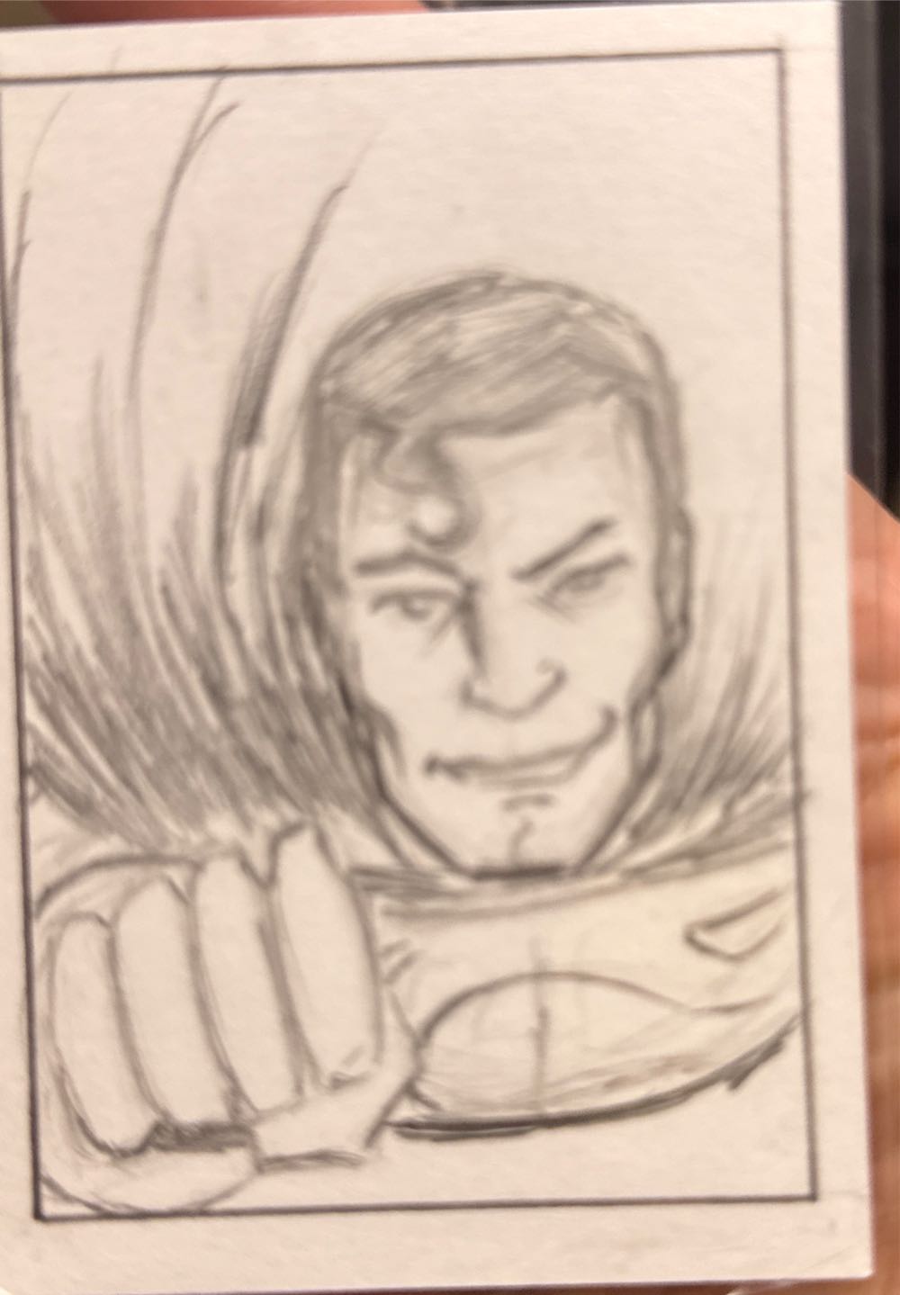 Superman pocket watch with classic Superman shield on the face and on the cover